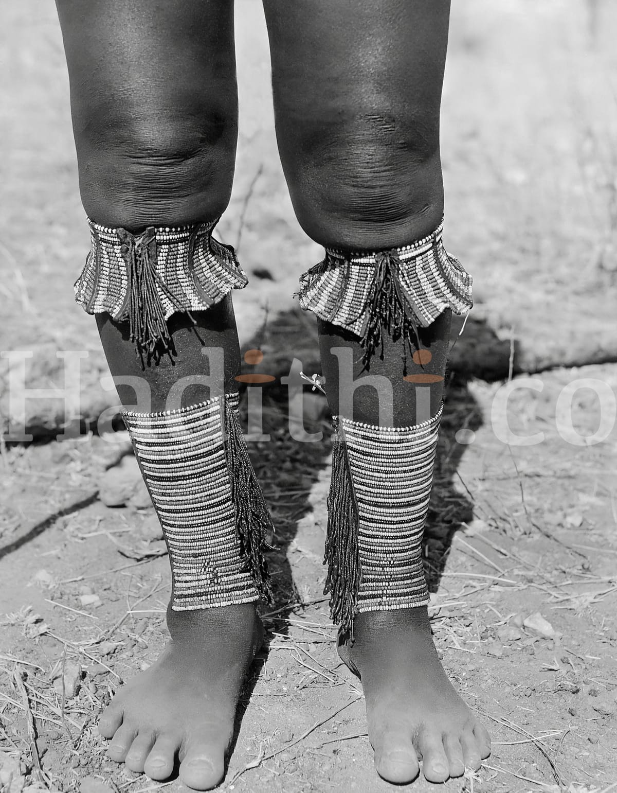 A close-up picture of the anklets and frills worn below the knees